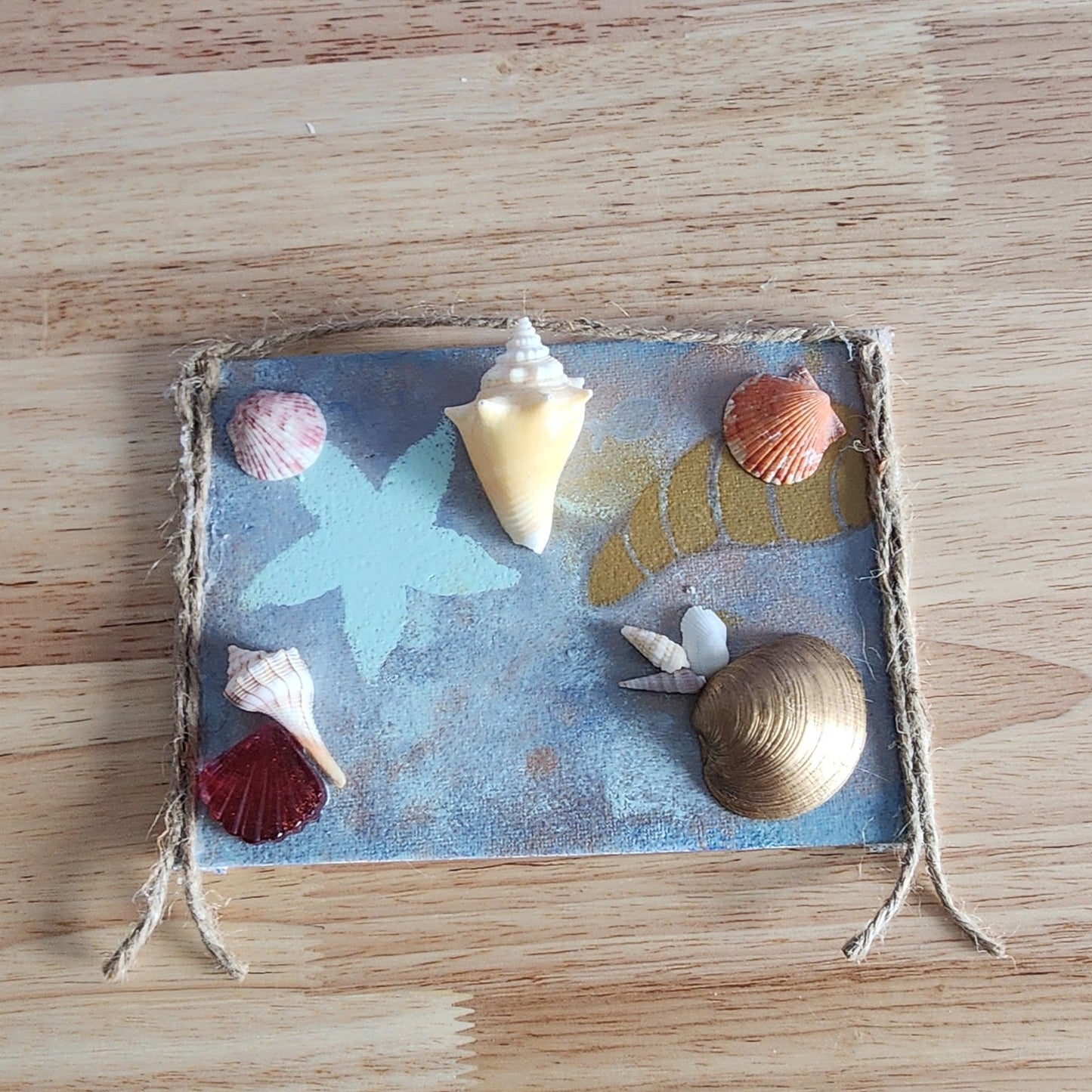 Golden Horn Shore seashell jewelry holder wall decor with real shells and resin accent, handmade coastal wall art