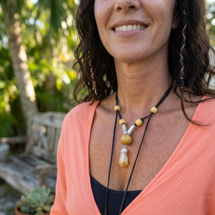 Women wearing lariat with citrine gemstone