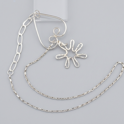 Silver lariat on display