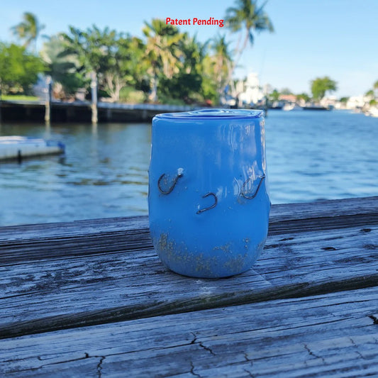 Blue Tide Hook & Tumble™ stemless wine tumbler on dock – ocean blue - in epoxy with real fishing hooks handmade in South Florida