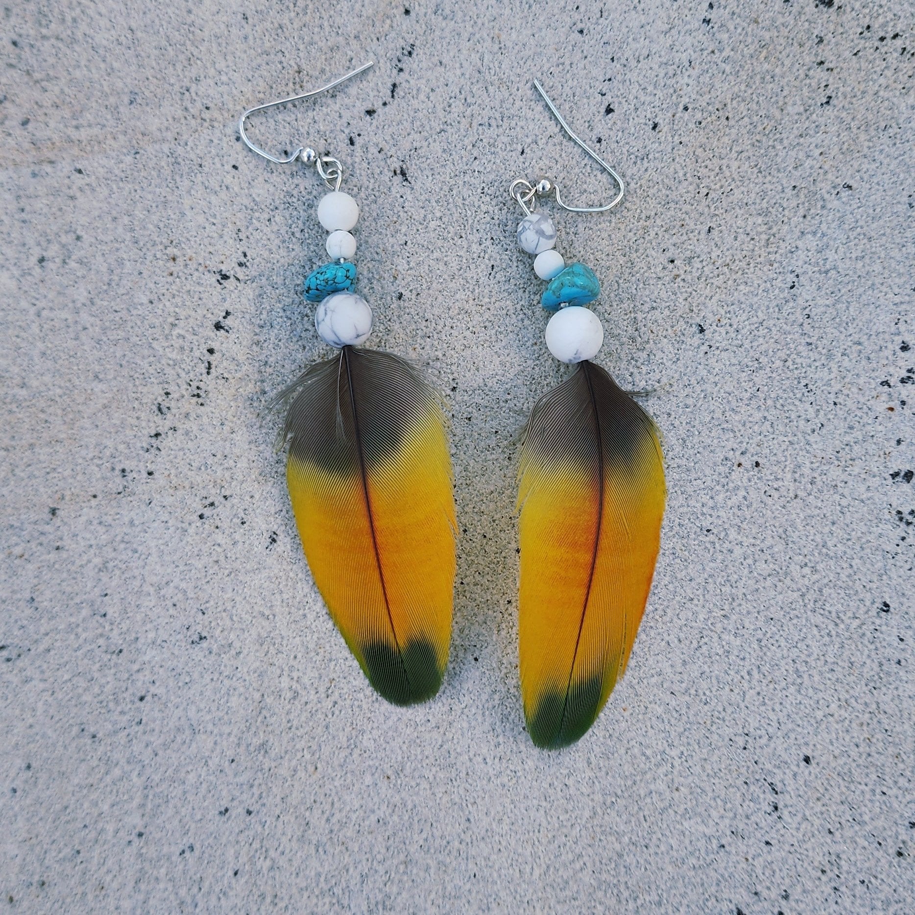 Feather Earring turquoise and white howlite laying flat