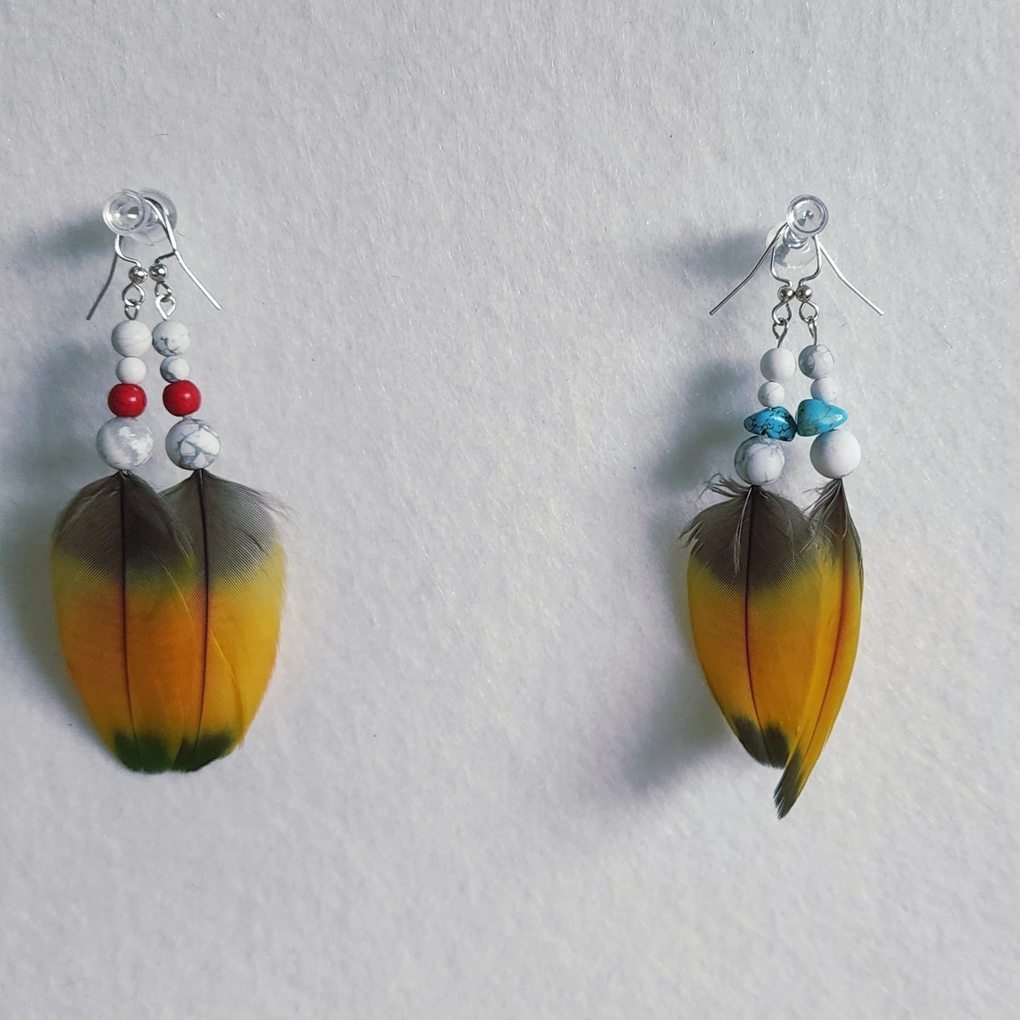 Feather Earring turquoise and white howlite and a pair with white howlite and coral beads