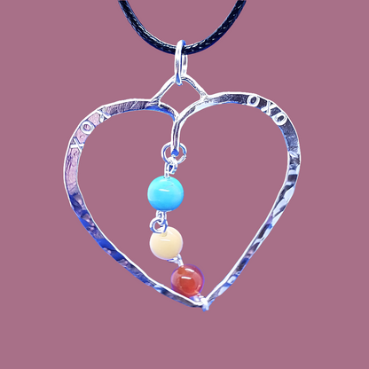 Handcrafted Sterling Silver Heart Pendant – Hammered Texture with Blue Howlite, Yellow Jasper, and Orange Aventurine