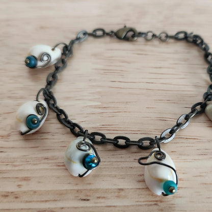 Bracelet clasp and chain detail showing adjustable link on oxidized oval link shell bracelet