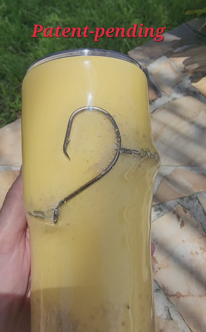 Golden Hour 20oz Hook & Tumble fishing tumbler rotating video showing authentic fishing hook and sand accent on golden yellow, dock and boat setting