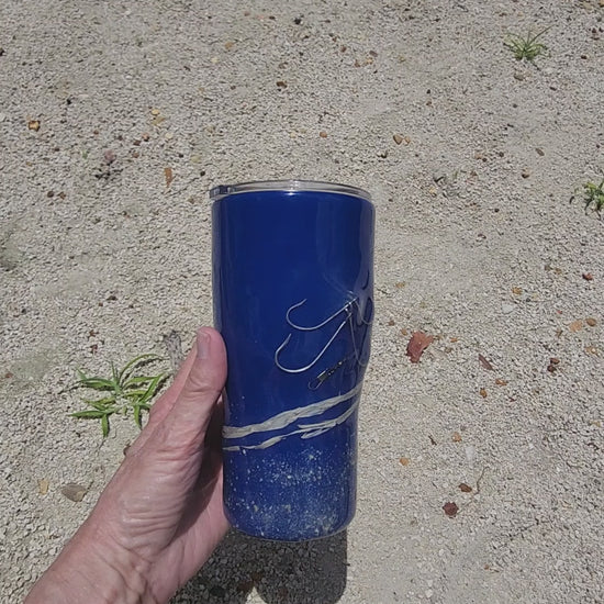 Video of handmade 20oz Blue Ink fishing hook tumbler with real saltwater hooks, barrel swivel and natural raffia, Hook & Tumble coastal drinkware