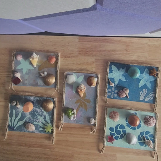  video of five seashell jewelry holder wall decor with real shells and resin accent, handmade coastal wall art