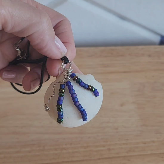 Handmade Lucina shell pendant necklace with silver wire wrap and multicolor bead strands video