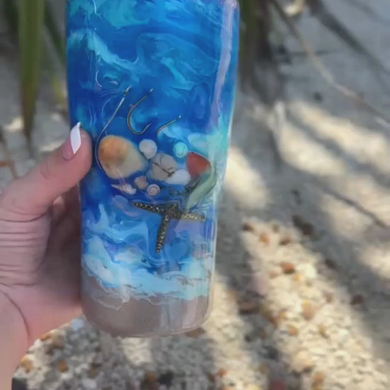 Hook & Tumble™ 20oz blue ocean seashell fishing hook tumbler 360 view, real hooks shells starfish sea glass shimmer
