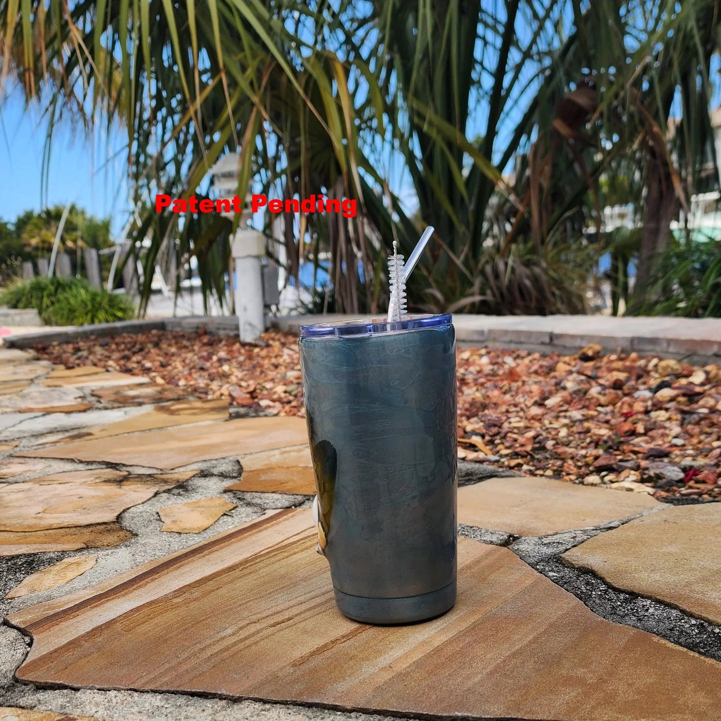Ocean-shimmer teal finish on handmade USA seashell tumbler
