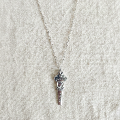 Close-up of Rolex vintage spoon handle pendant, genuine sterling silver chain necklace