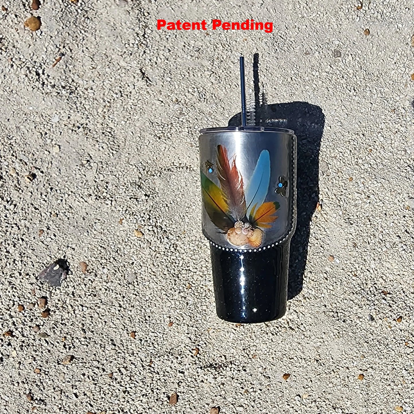 Black shimmer 30oz tumbler with exotic feathers and shell cluster – handmade coastal statement cup