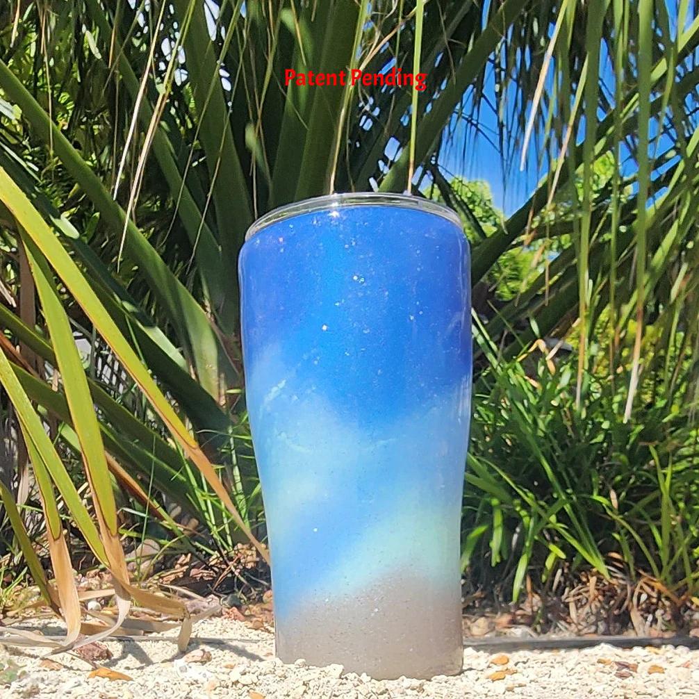 Blue ombre Saltwater Sips™ 20oz seashell tumbler back view, cobalt blue ombre shimmer, Patent Pending