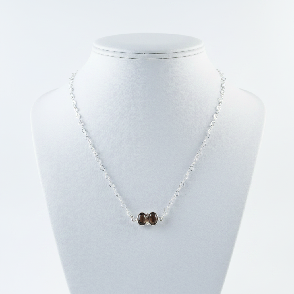 Sterling silver necklace with smoky quartz stones and heart-link chain