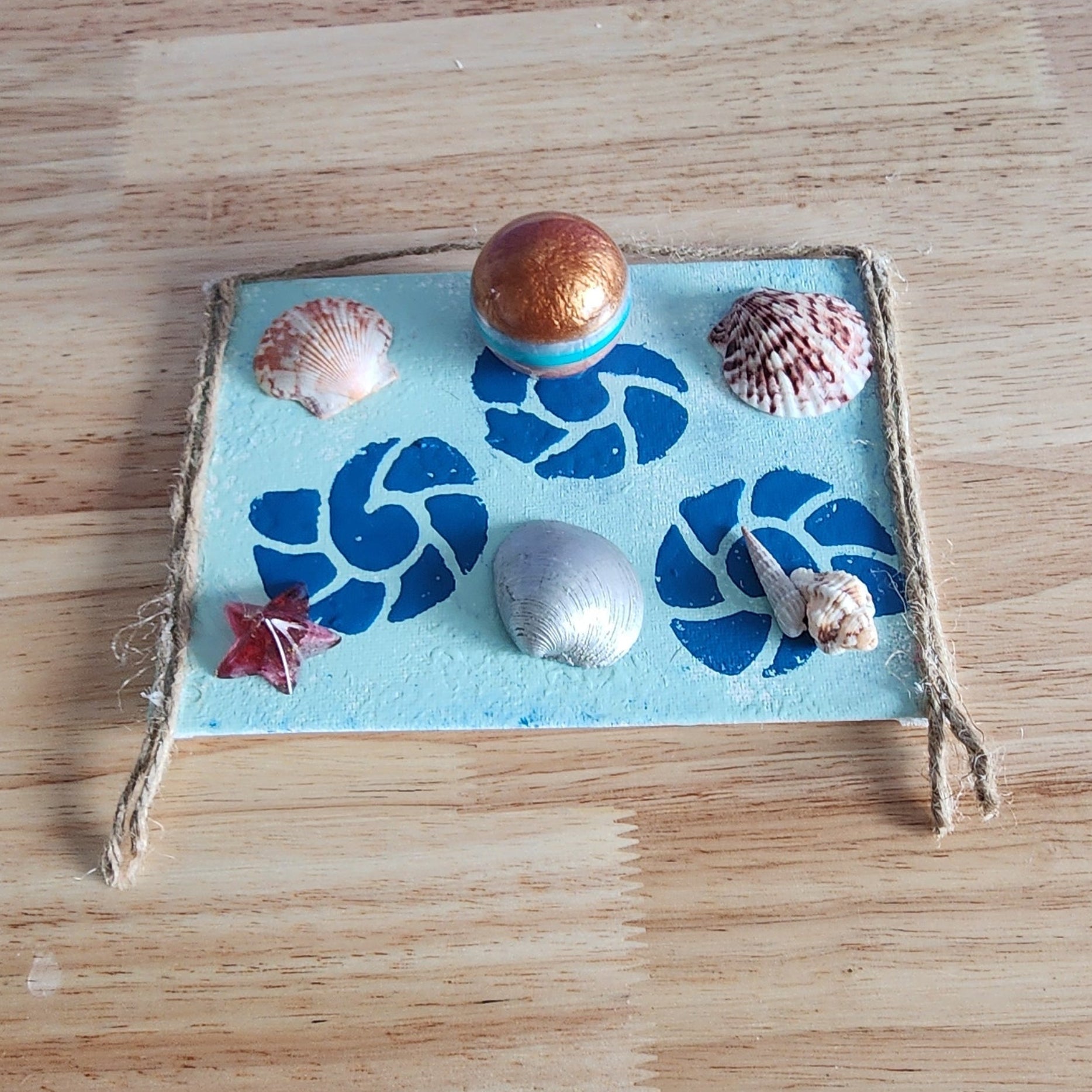 Sea Snail Reef seashell jewelry holder wall decor with real shells and resin accent, handmade coastal wall art