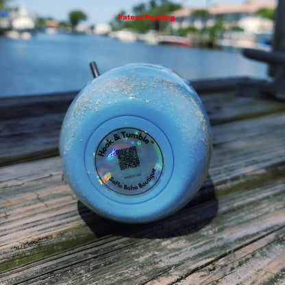 Bottom view of Blue Tide Hook & Tumble™ tumbler showing real fishing hooks and coastal sand  in epoxy resin