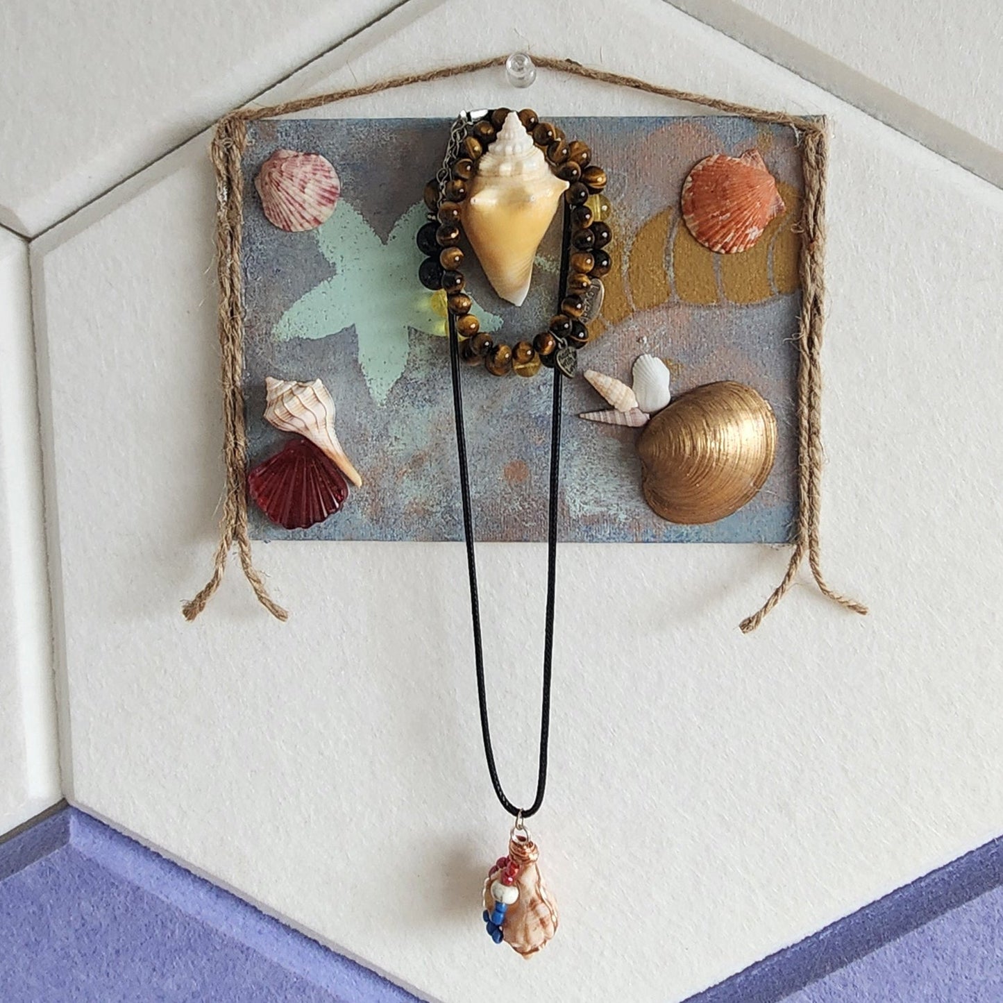 Golden Horn Shore seashell jewelry holder wall decor with real shells and resin accent, handmade coastal wall art
