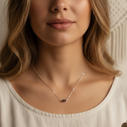 Woman wearing sterling silver smoky quartz pendant necklace elongated chain