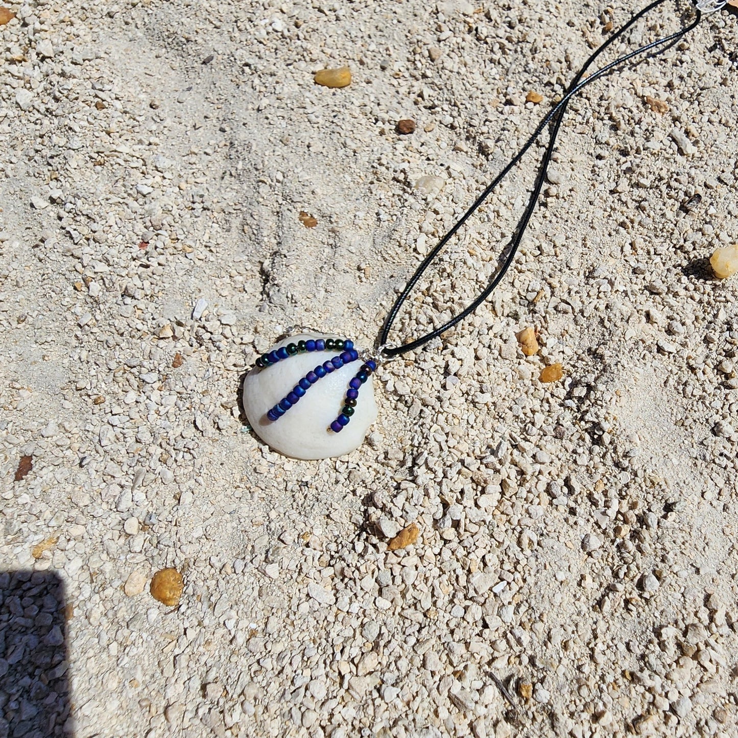 Authentic Lucina shell pendant necklace with silver wire wrap and multicolor bead strands