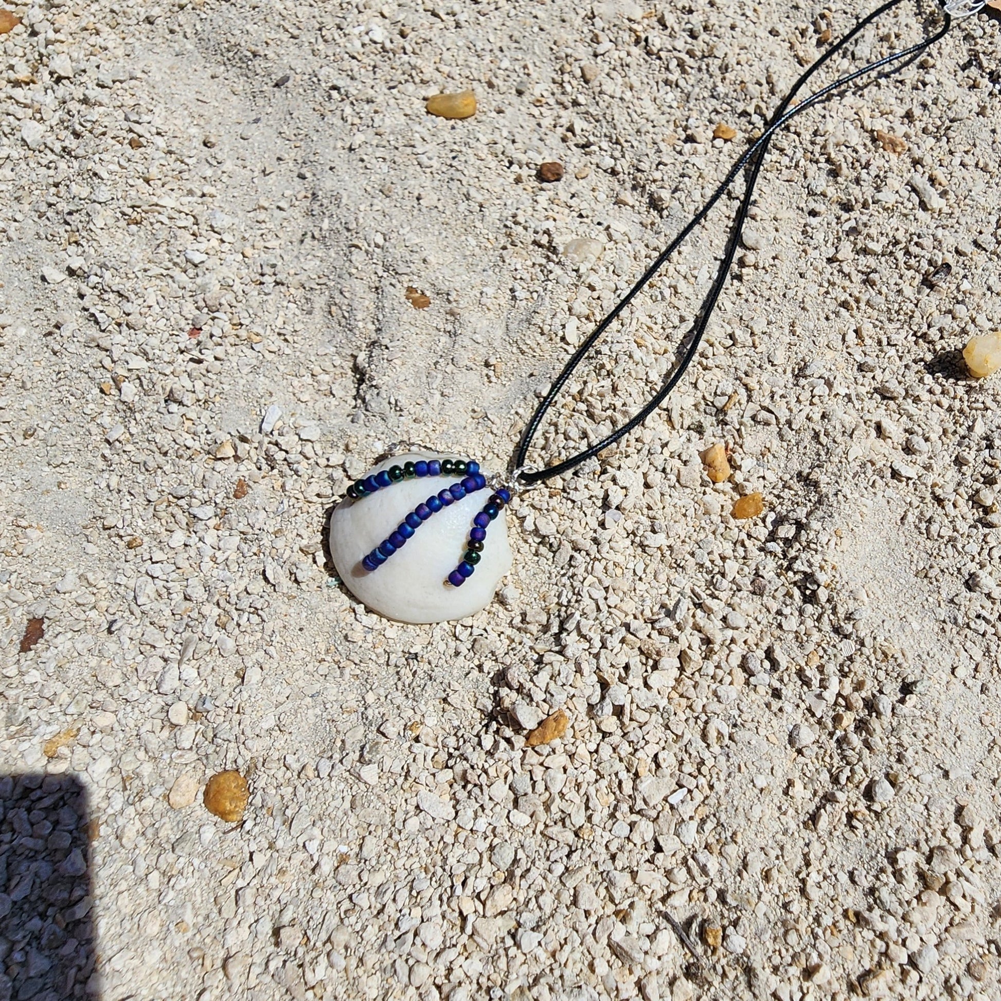 Authentic Lucina shell pendant necklace with silver wire wrap and multicolor bead strands