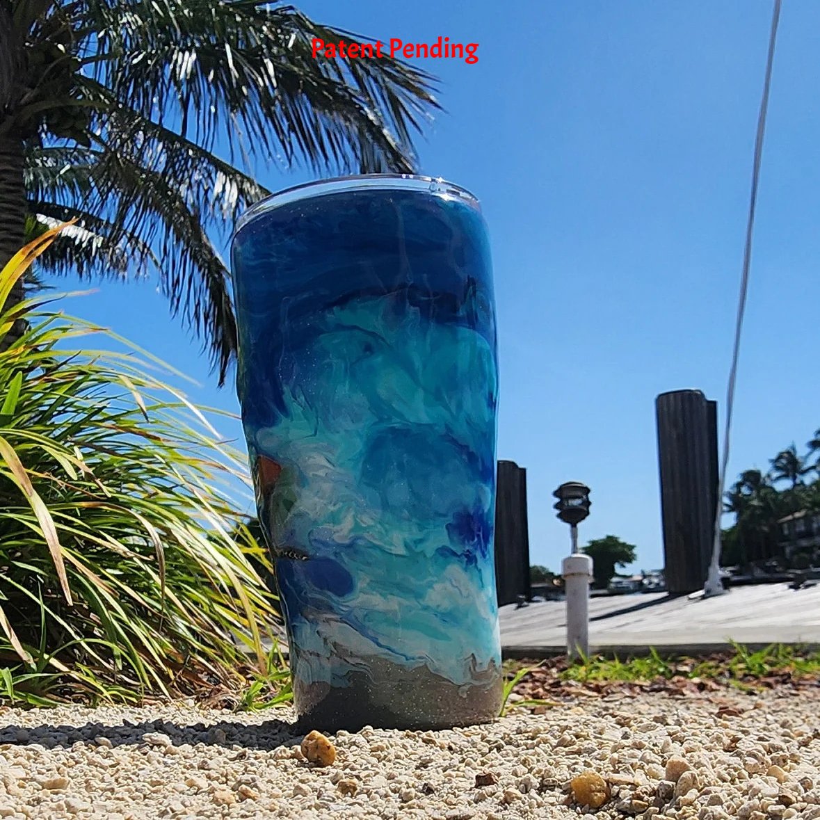 Blue ocean Hook & Tumble™ 20oz tumbler right side, deep cobalt teal swirl design, shimmer detail, Patent Pending