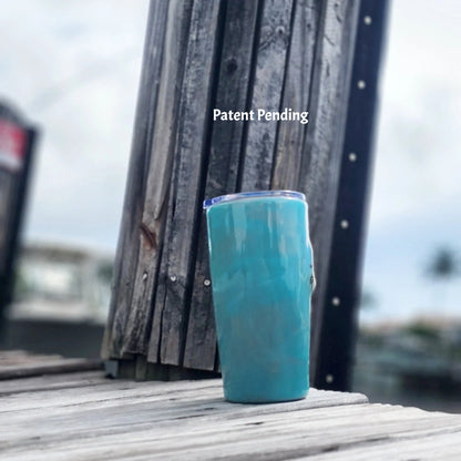 Right view of seashell tumbler with starfish charm, turquoise finish, handmade in Florida