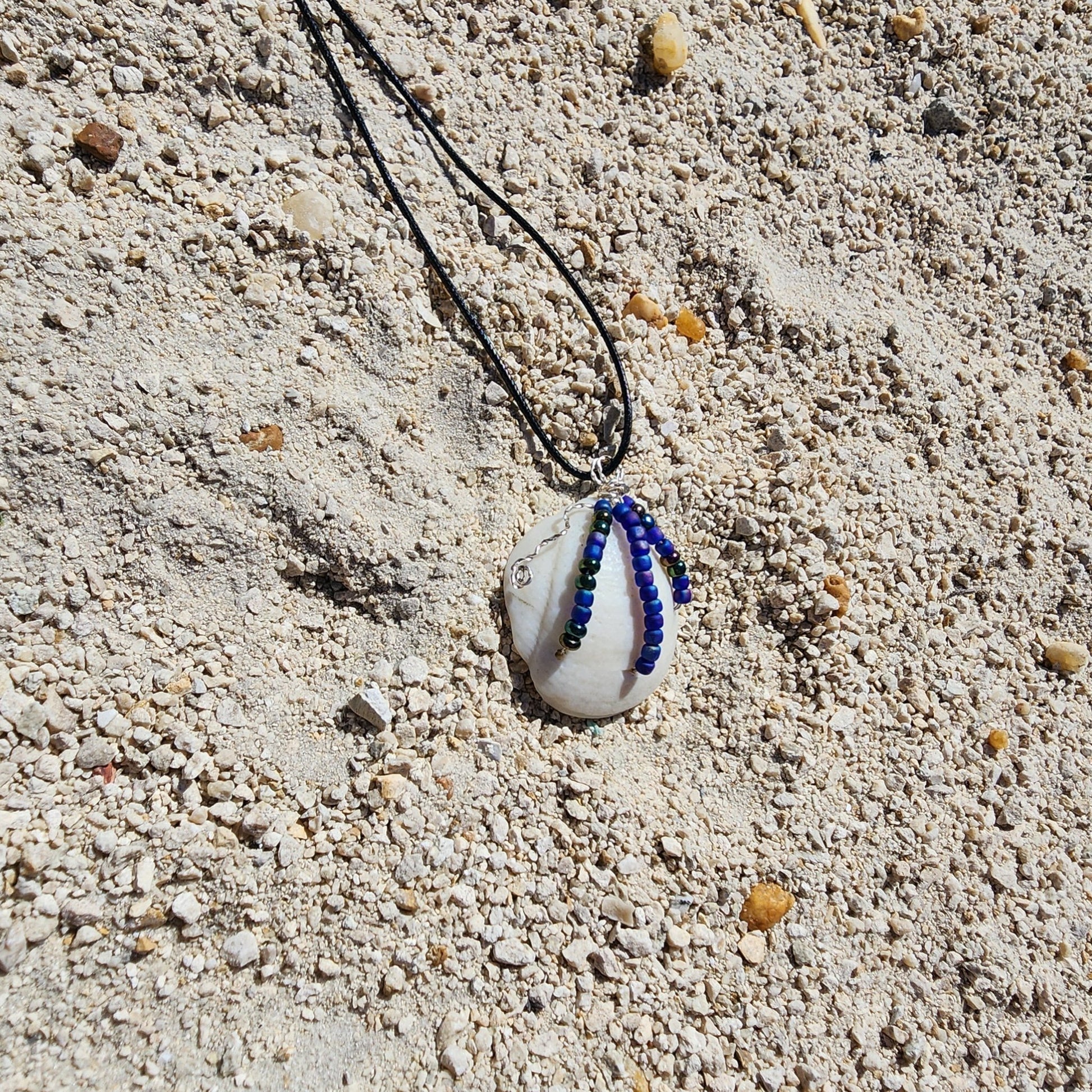 Florida Lucina shell pendant necklace with silver wire wrap and multicolor bead strands