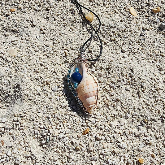 Handmade tulip shell pendant necklace with copper wire wrap, blue ceramic bead, and glass beads on cord