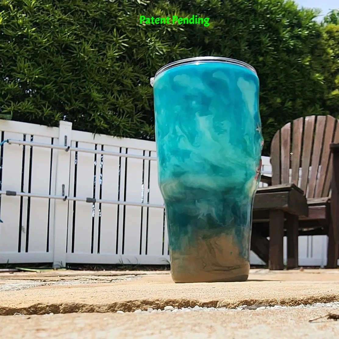 Handmade 30oz teal Caribbean coastal fishing tumbler back view showing full Caribbean water-inspired teal and aqua swirling design - Hook & Tumble™ by SoFlo Boho Boutique, handcrafted in South Florida.