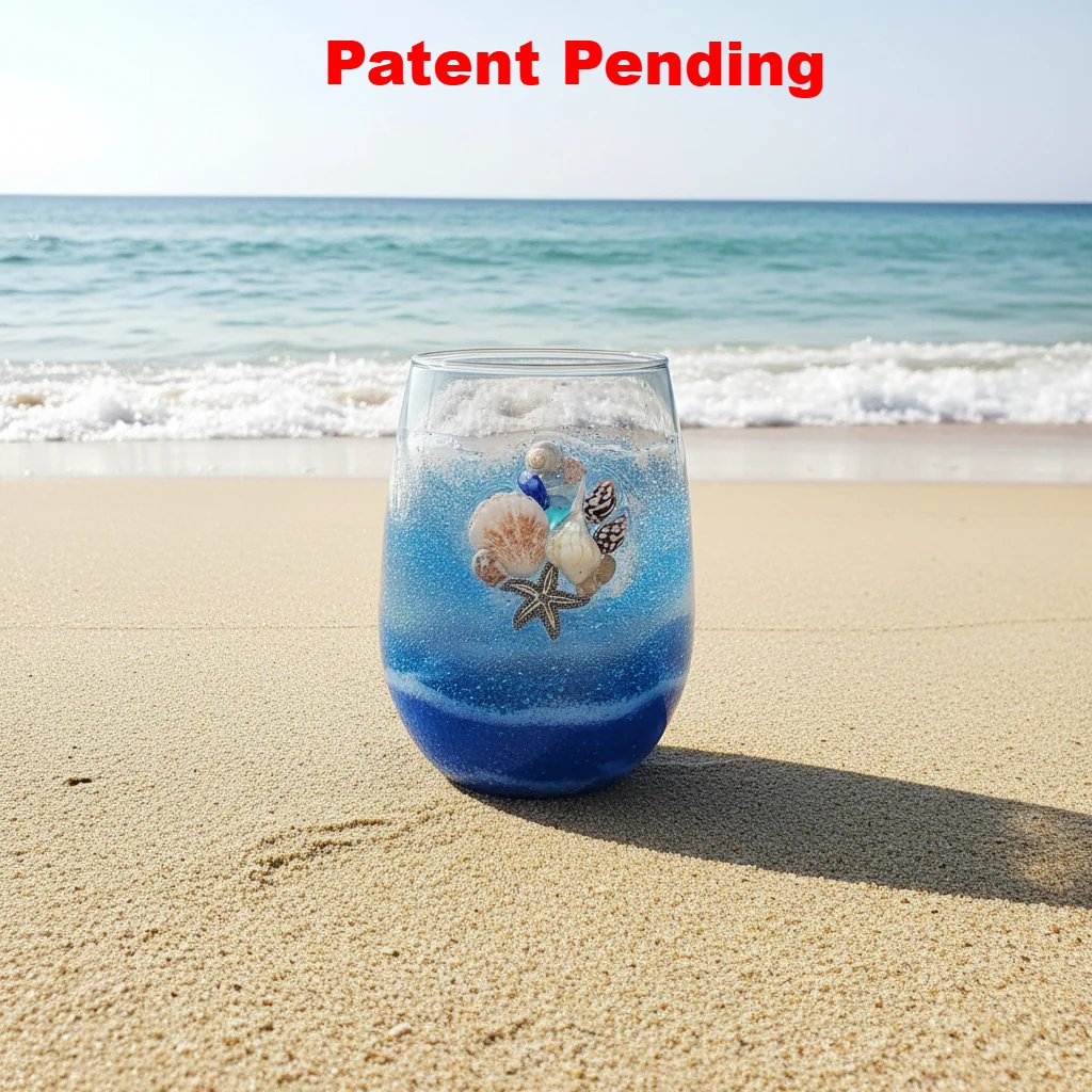 Stemless wine lass decorated with seashells