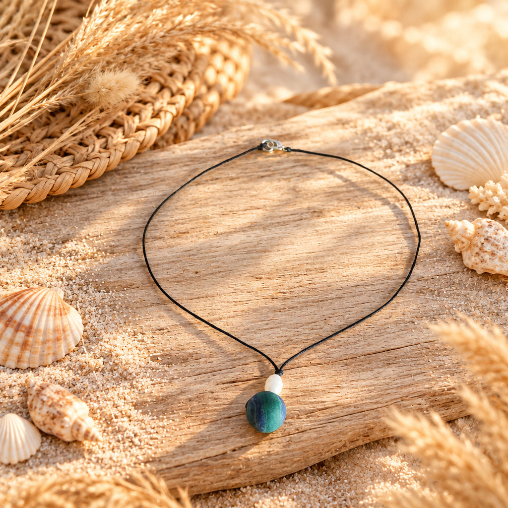 Handmade teal gemstone necklace on natural fiber background, South Florida jewelry