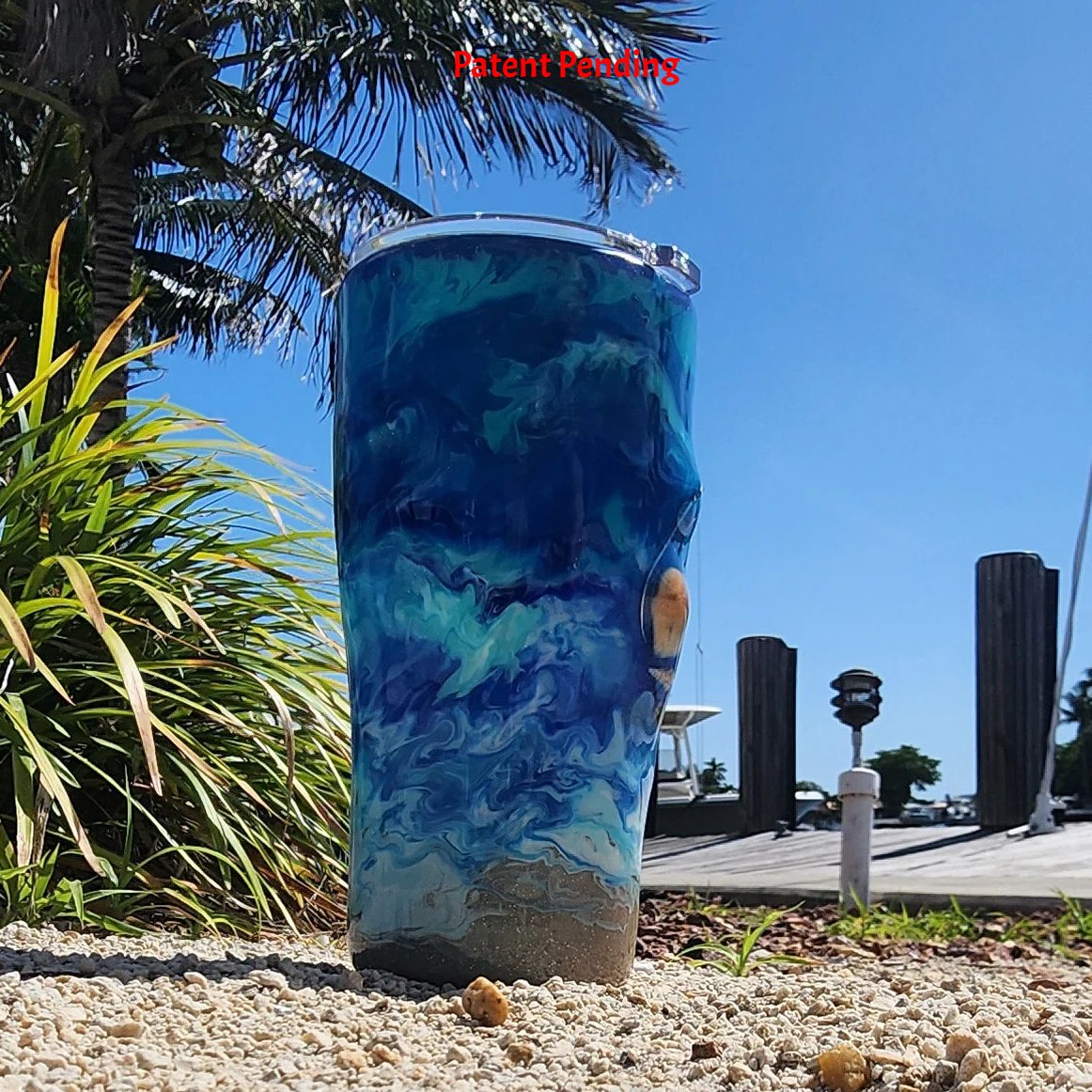 Blue ocean Hook & Tumble™ 20oz tumbler back left view, turquoise howlite and sea glass visible, Hook & Tumble™ Patent Pending