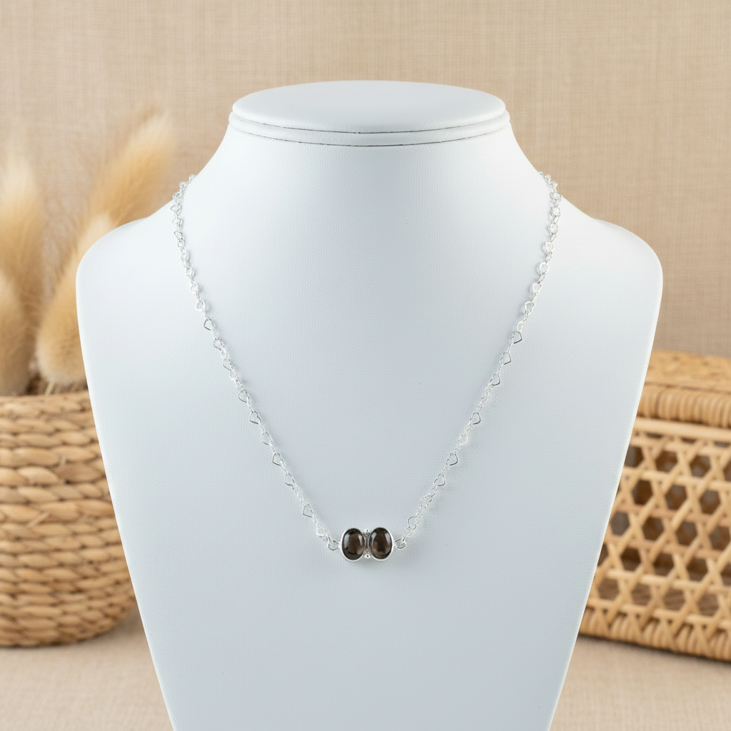 Sterling silver necklace with smoky quartz stones and heart-link chain