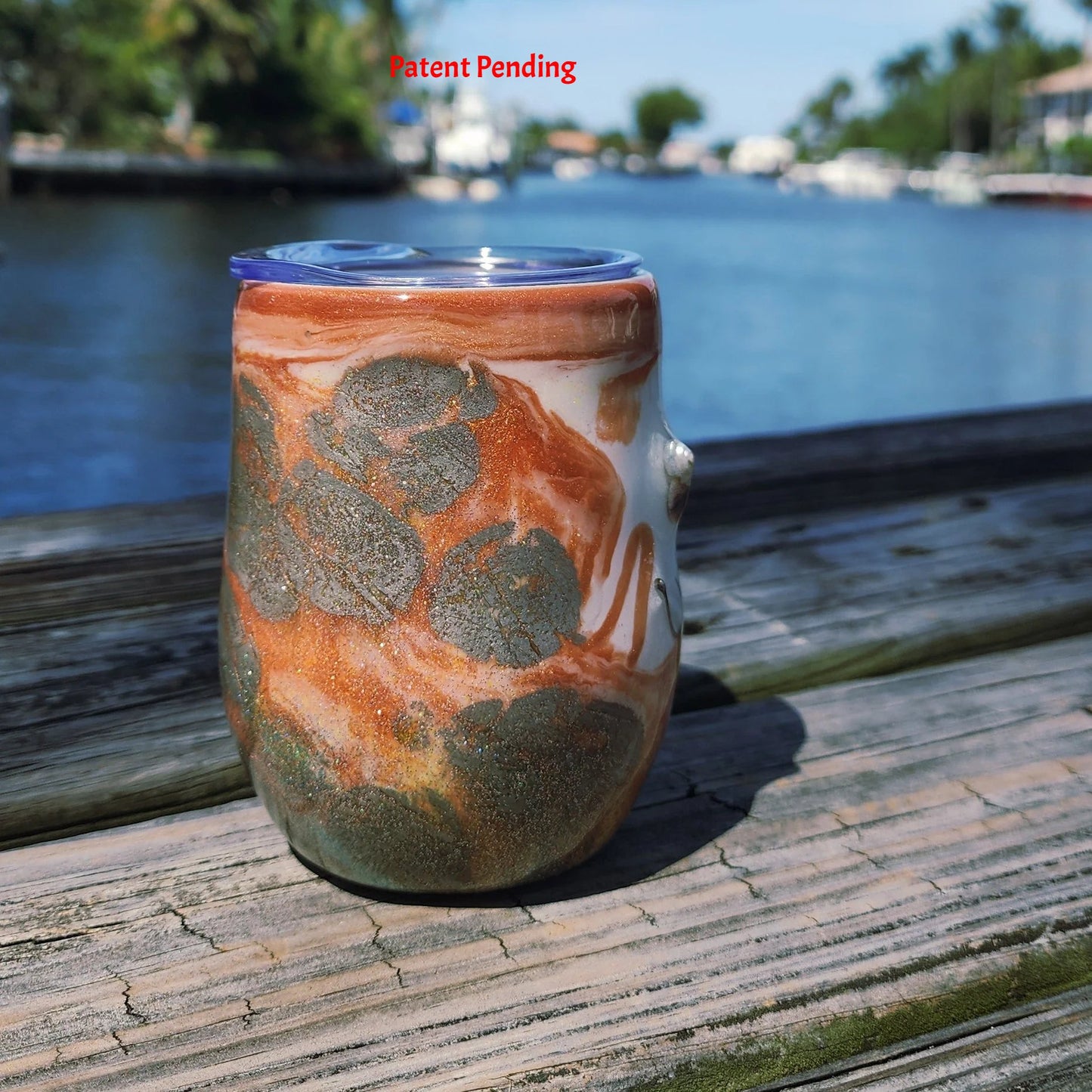 Handmade coastal tumbler back view, brown terracotta cream epoxy resin with real hooks and shells, one of a kind drinkware