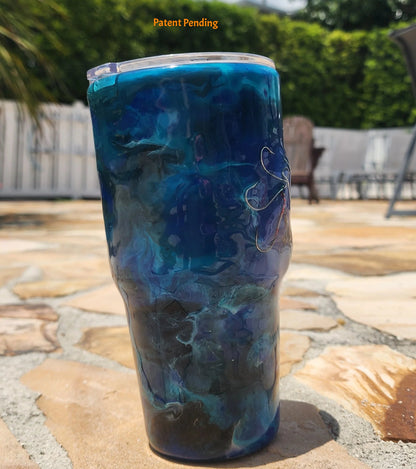 Right side view of blue Open Water fishing hook tumbler showing deep cobalt and teal handmade 30oz coastal drinkware