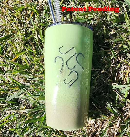 Handmade lime green fish hook tumbler with embedded hooks and sand, coastal insulated drinkware