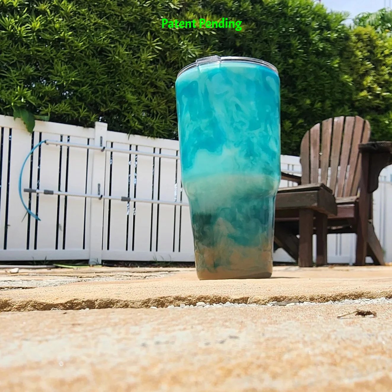 Handmade 30oz teal Caribbean coastal fishing tumbler back view showing full Caribbean water-inspired teal and aqua swirling design - Hook & Tumble™ by SoFlo Boho Boutique, handcrafted in South Florida.