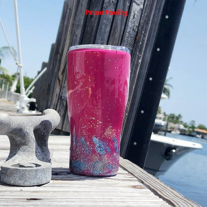 Back view of the 20oz Saltwater Sips beach tumbler, displaying the clean, vibrant high-gloss magenta finish meeting the blue glittered tideline and textured real sand base.