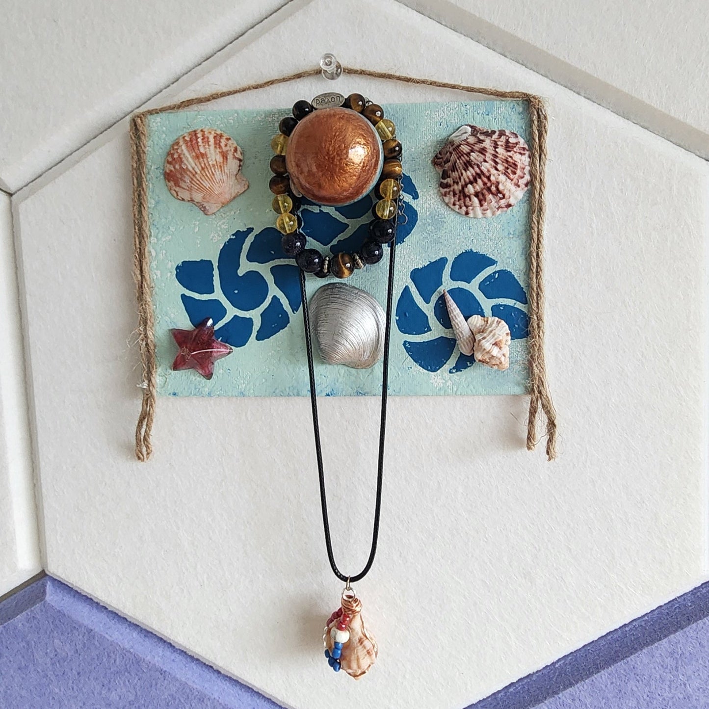 Sea Snail Reef seashell jewelry holder wall decor with real shells and resin accent, handmade coastal wall art