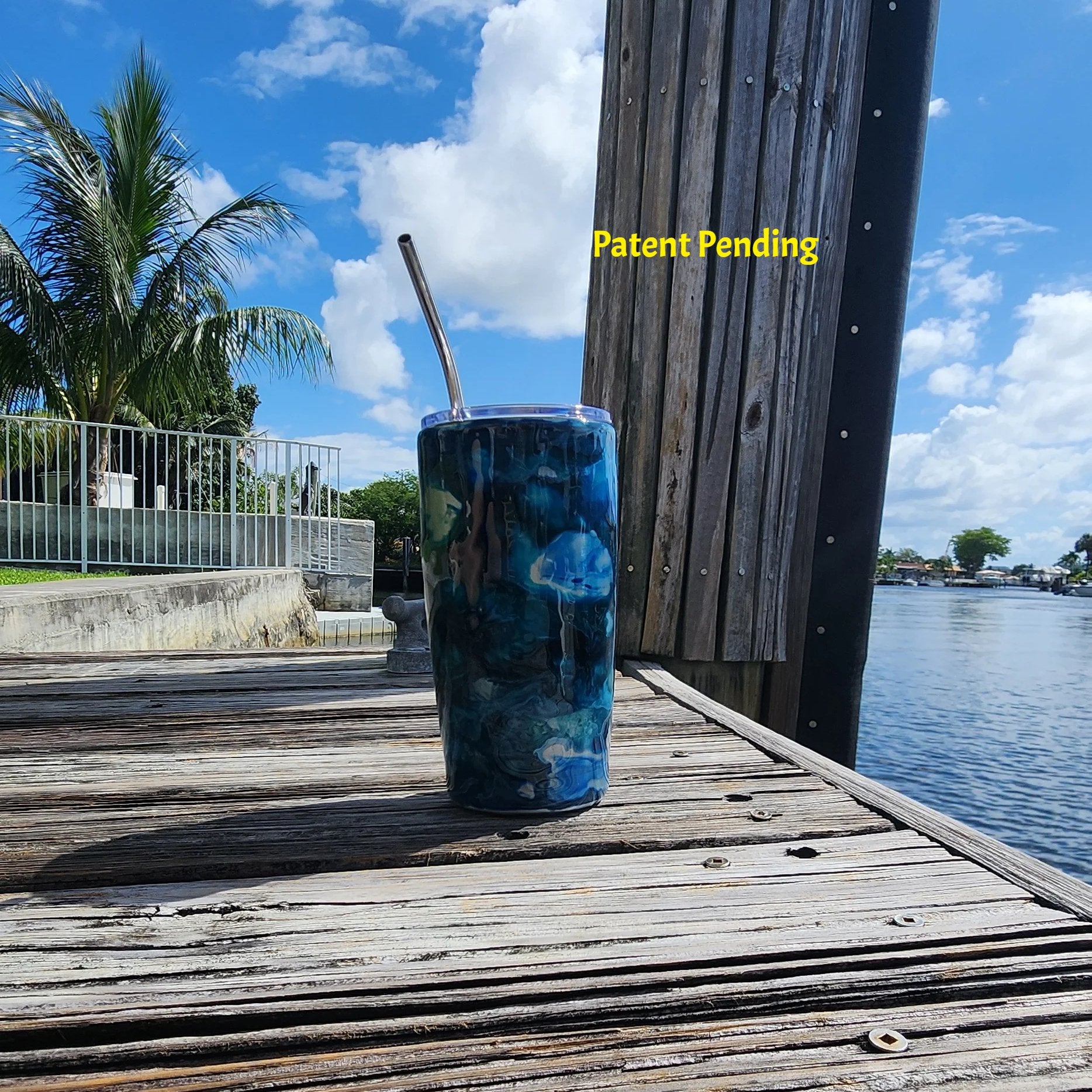 Blue Lagoon Hook & Tumble 20oz tumbler dock lifestyle photo, Patent Pending handmade in South Florida