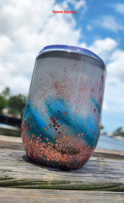 Rose gold teal glitter coastal tumbler outdoors | Saltwater Sips™ handmade drinkware