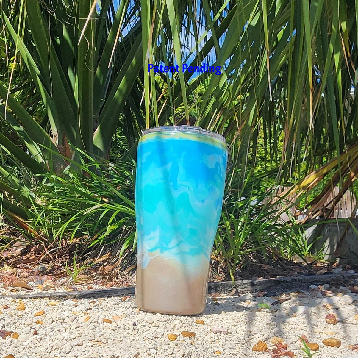 Turquoise ocean wave fishing hook tumbler 20oz back left view, seafoam and turquoise design, Hook & Tumble™ Patent Pending