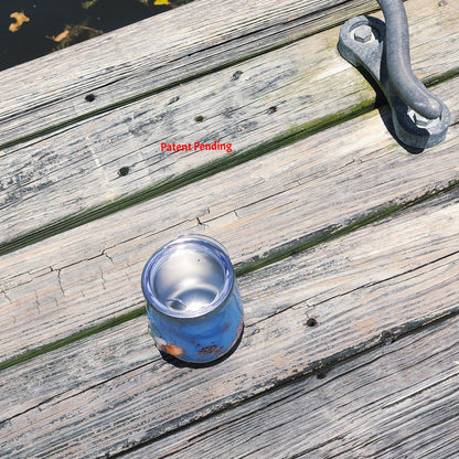 Top view of Rose Gold Saltwater Sips™ wine tumbler showing dense seashells, snail shell and rose gold glitter in clear epoxy resin