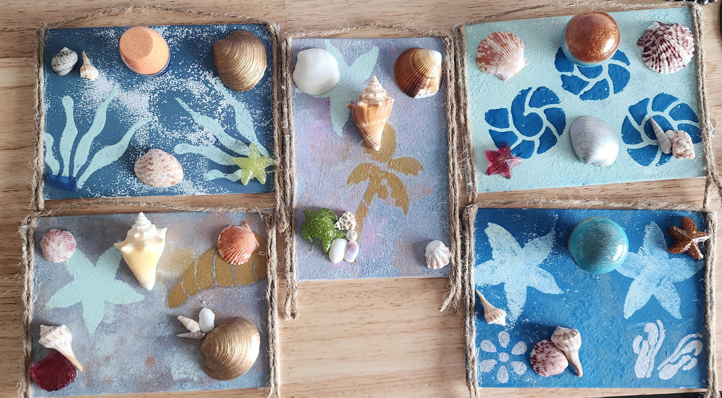 Image of five variations of seashell jewelry holder wall decor with real shells and resin accent, handmade coastal wall art