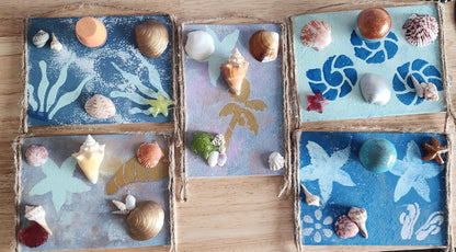 Image of five variations of seashell jewelry holder wall decor with real shells and resin accent, handmade coastal wall art