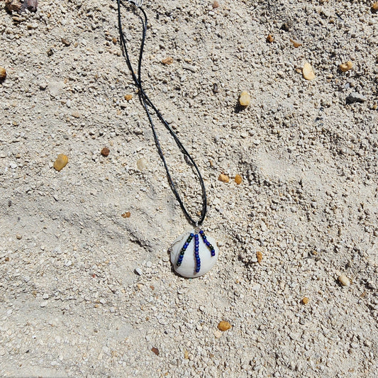 Handmade Lucina shell pendant necklace with silver wire wrap and multicolor bead strands