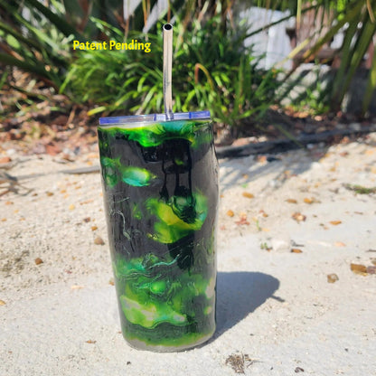 Hook & Tumble 20oz coastal tumbler in green tones lifestyle shot