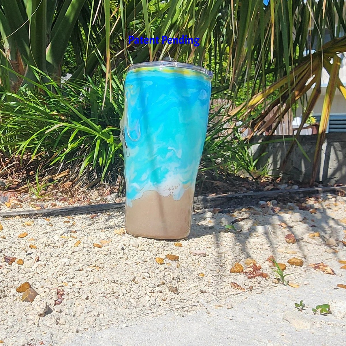 Turquoise ocean wave fishing hook tumbler 20oz right side, gold shimmer detail, Hook & Tumble™ Patent Pending
