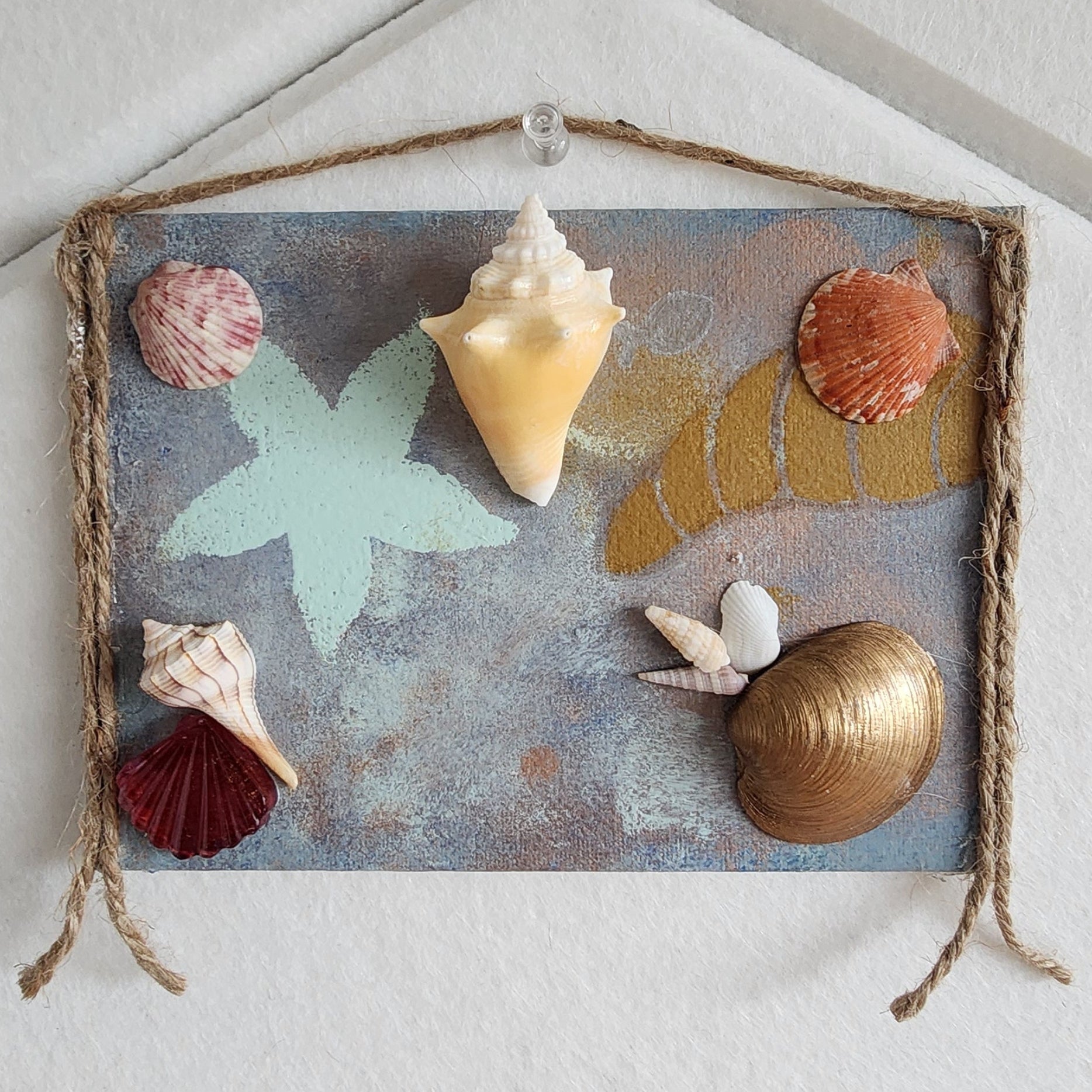 Golden Horn Shore seashell jewelry holder wall decor with real shells and resin accent, handmade coastal wall art