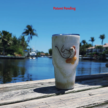 Side angle Shore Thing Hook & Tumble™ showing multiple real fishing hooks and seashell pieces in epoxy resin